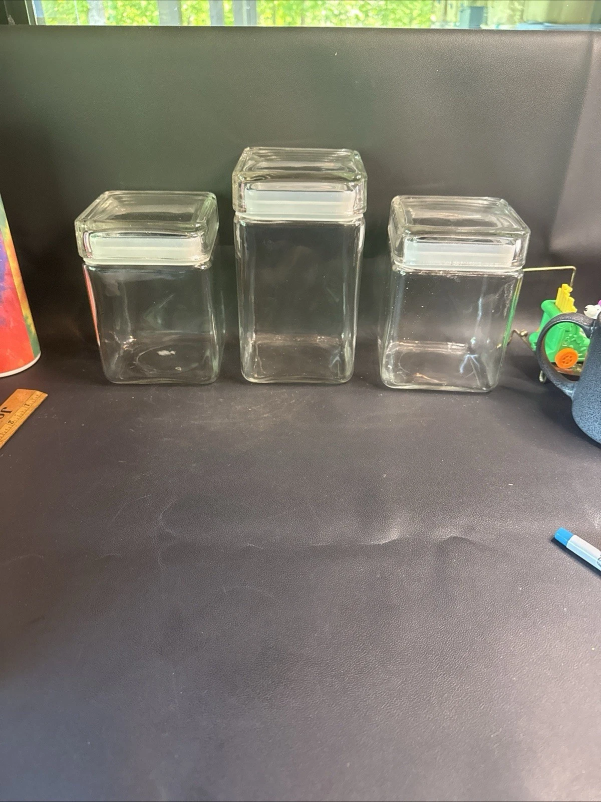 Set Of 2 6”x4” square glass storage jars And One 7.5” x 4 Inches