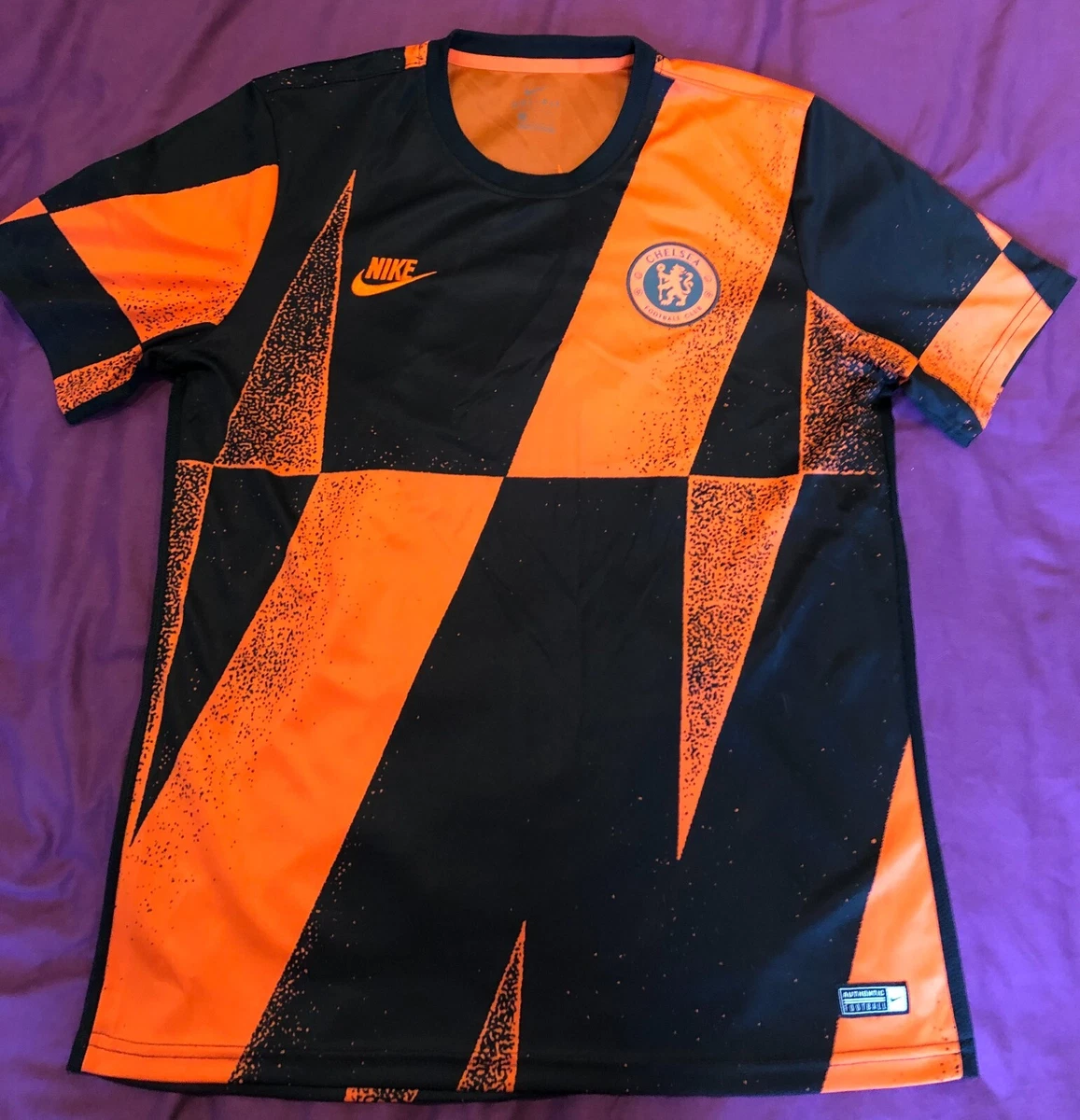 Chelsea orange cheap and black kit