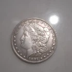 1881 Morgan Silver Dolllar AU+ "slider" Light Rim Toning Great Eye appeal.