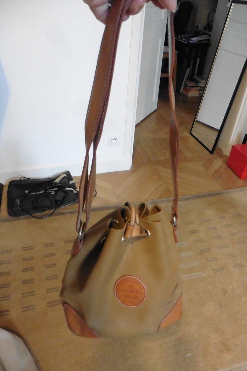 Sac à main bourse Lancel en cuir et toile cirée beige marron brun