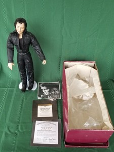 elvis porcelain doll
