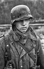 WW2 Picture Photo German soldier in a helmet and overcoat 5991