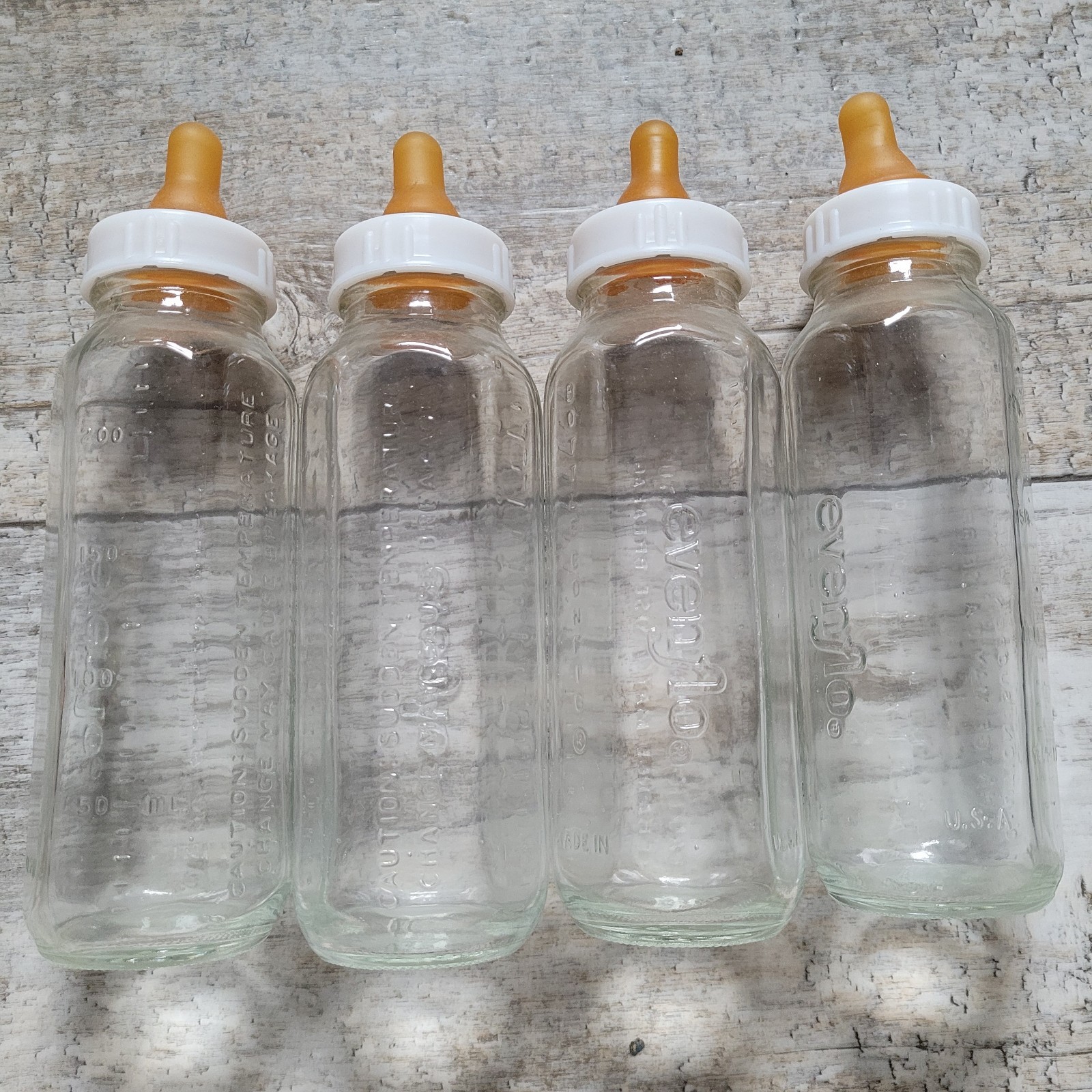 Vintage Evenflo Glass Baby Bottle With Rubber Nipple and Sto