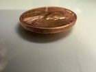 1958 wheat penny no mint mark, Lightly circulated L on rim — photo 7