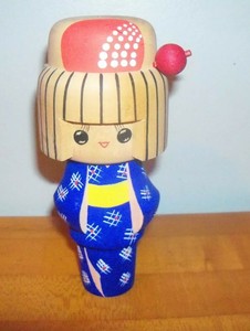 wooden geisha doll