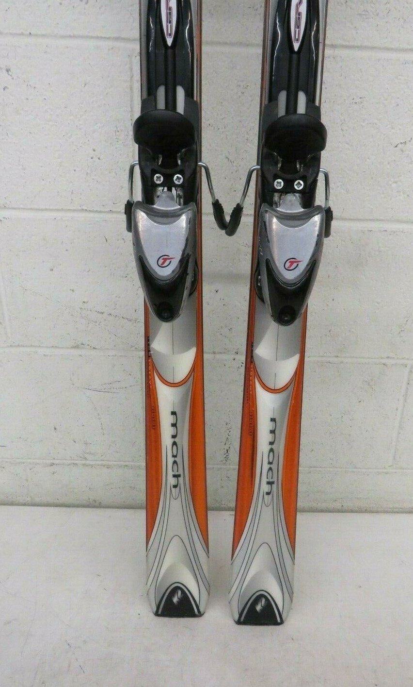 Solved An 79.5 kg skier is gliding on her waxed wood skis