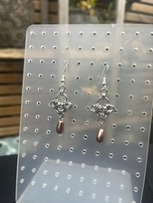 Chainmail dangly handmade earrings with dark rose coloured drops