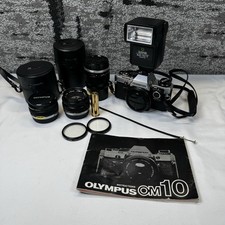 Olympus OM-10 35mm SLR Film Camera - Black W/ Multiple Lenses