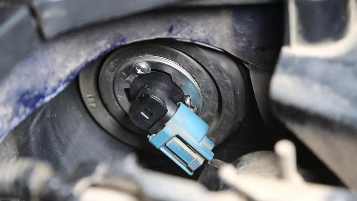 Lock in the replacement headlight bulb.