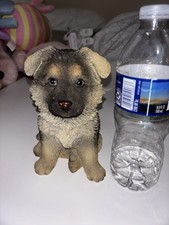 A Sitting German Shepherd Puppy Dog Figurine 4" x 6"