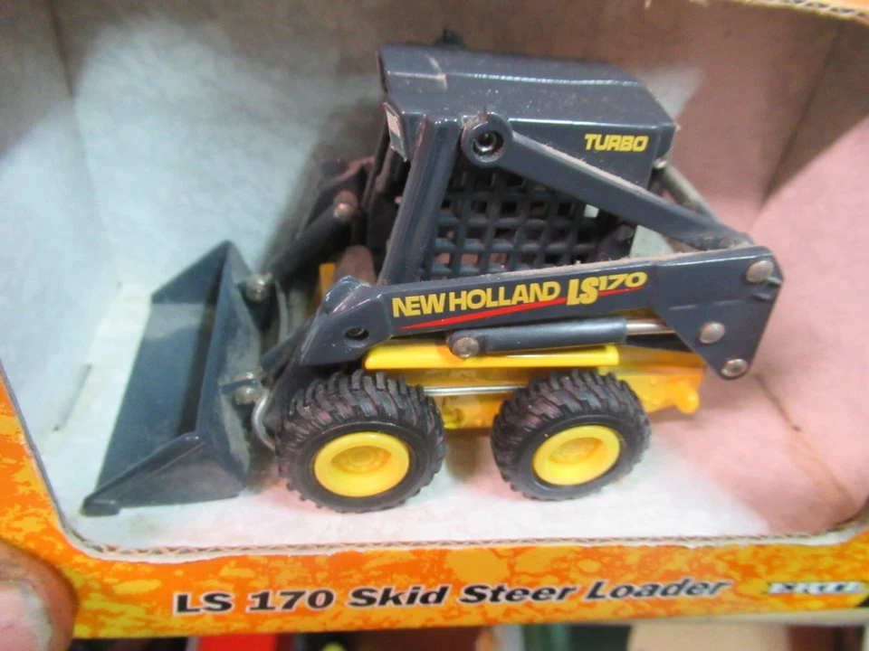 Minicargadora COMO NUEVA 1:32 Gran Bretaña ERTL 13563 Construcción NUEVA HOLANDA LS 170 Foto 2 de 4