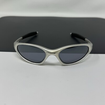 Oakley Minute FMJ 5.56 Silver Sunglasses - Black Iridium | eBay Oakley Minute FMJ 5.56 Silver Sunglasses - Black Iridium | eBay