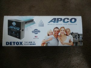 stainless steel backsplash behind gas stove