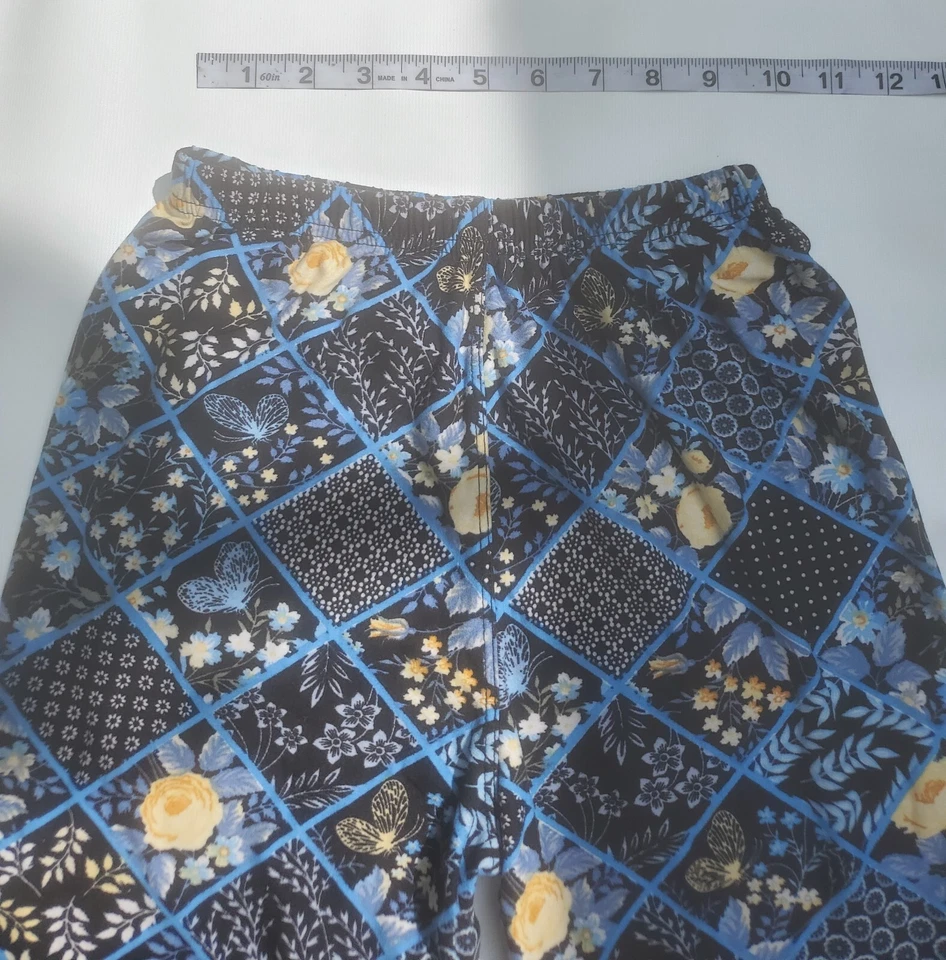 Leggings mariposa florales azules claros, negros y amarillos para mujer Foto 3 de 4