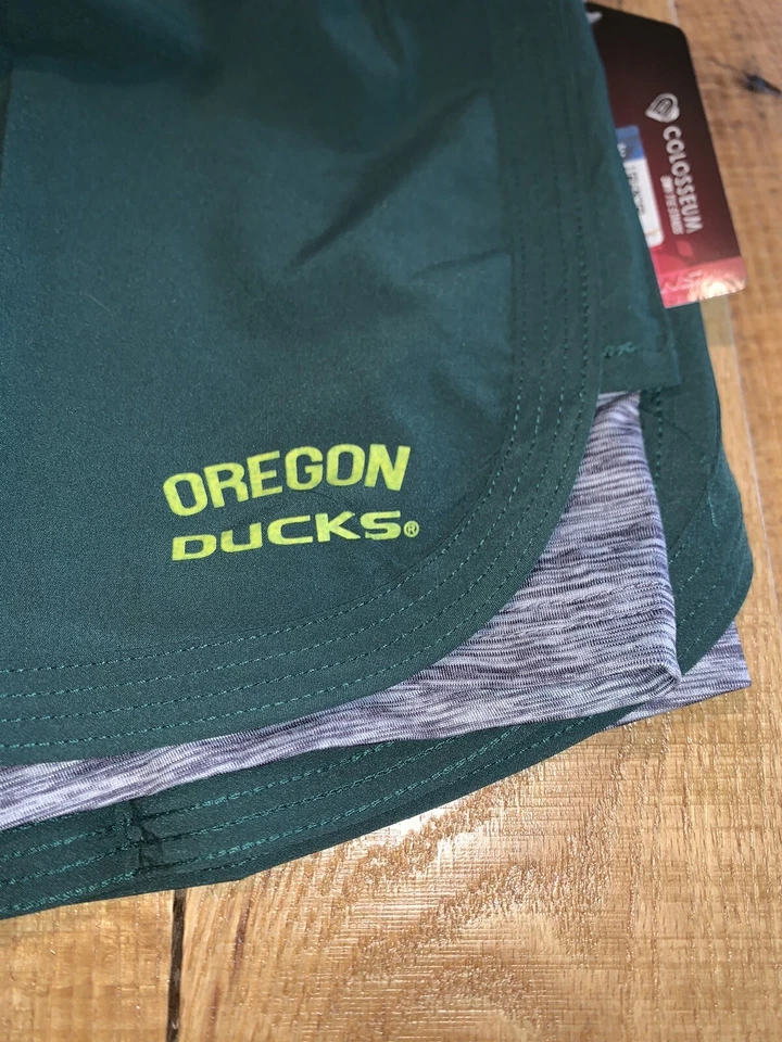 Pantalones Cortos Para Mujer Coliseo Oregon Ducks Verde Fuera Atléticos Universitarios Nuevos con Etiquetas Grandes Foto 3 de 4