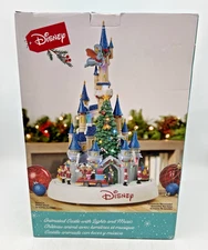 DISNEY ANIMATED CASTLE WITH LIGHTS AND CHRISTMAS MUSIC COSTCO 1487705 LIGHT USE