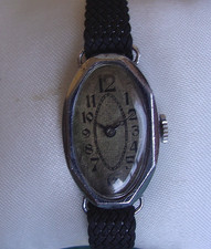 1 Montre dame RETRO mécanique fonctionnelle boitier ovale chromé