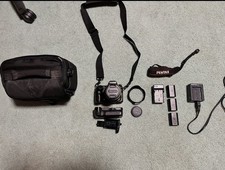 pentax k-3 with 18-135mm lens and battery grip
