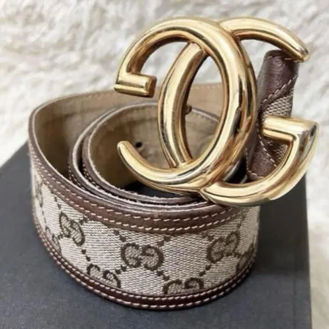 Ceinture Gucci en cuir marron avec motif GG et logo double C   Authentique et élégante