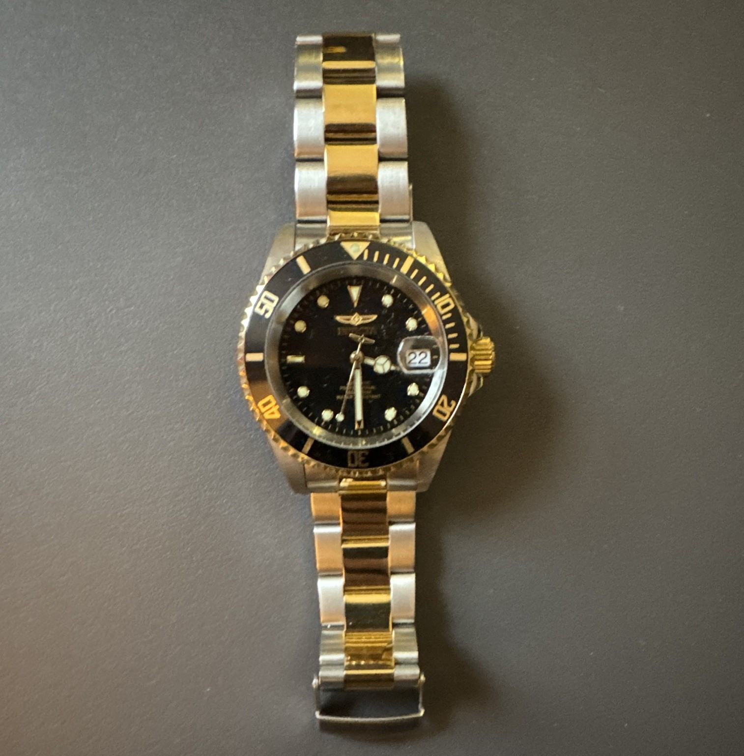 Invicta Groupings Men's Diver Watch Black Dial Quartz Date Two-Tone Bracelet