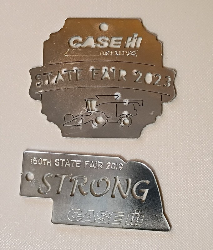 2019 & 2023  CASE IH "NEBRASKA STATE FAIR" Die Cut CHROME TOKENS? FOBS? ..NICE