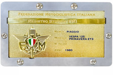 SUPPORTO "A SCOMPARSA" TARGA ORO FMI MODELLO CON RILIEVO IN ACCIAIO SENZA FORARE