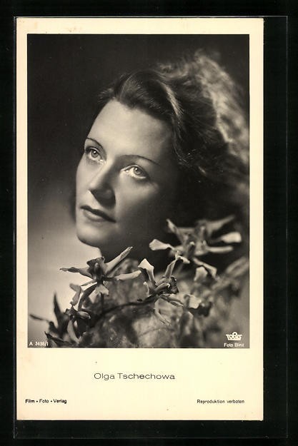 Actress Olga Chekhova with flowers, postcard
