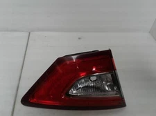 Used Left Tail Light Assembly fits: 2014 Ford Fusion lid mounted Hybrid SE L. Le