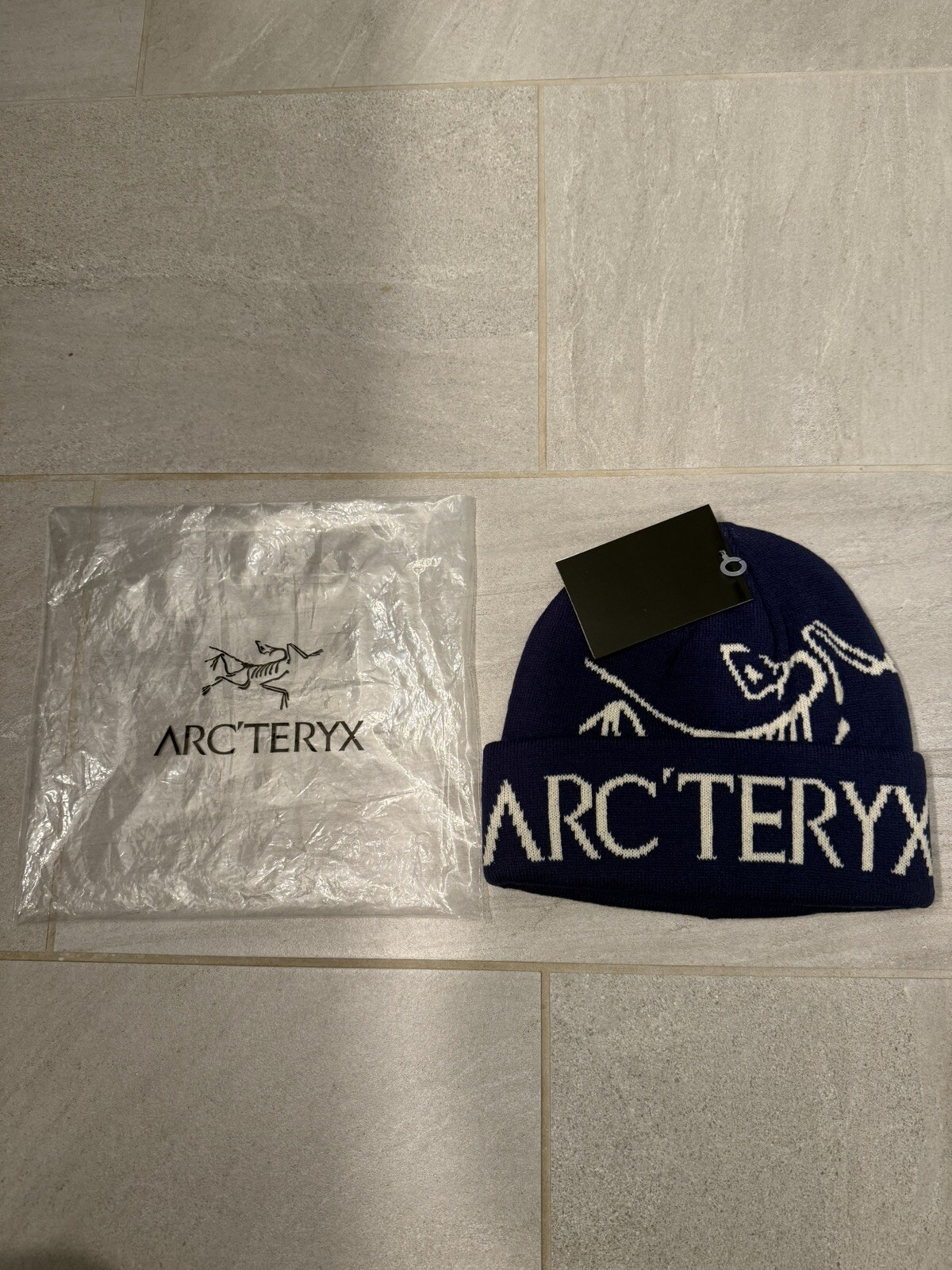 *NUOVO* Berretto uomo blu bianco Arc'teryx uccellino escursionismo outdoor