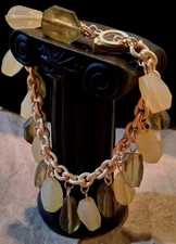 Goldtne Braclet 8.25" Tgle Clsp Green And Clear Light Colored FacetedGlass Beads