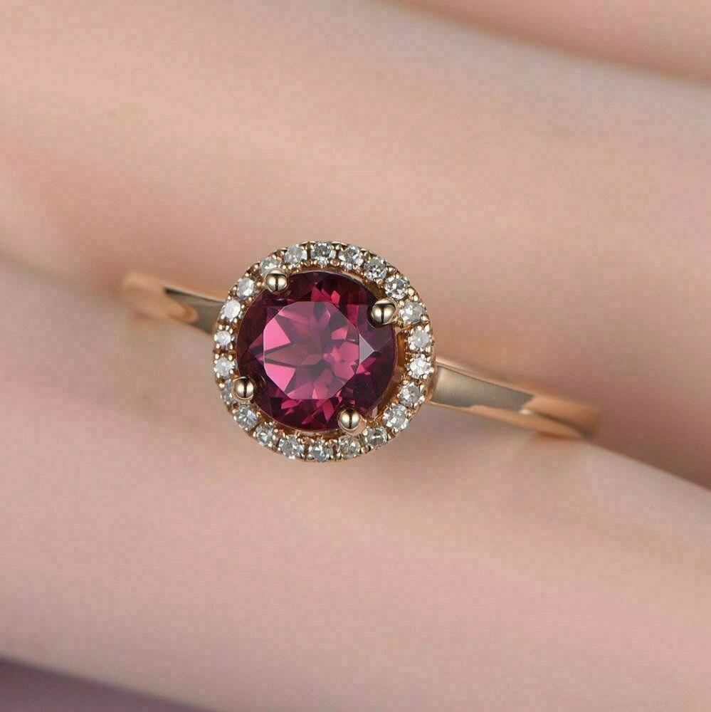 Dark pink sapphire ring deals