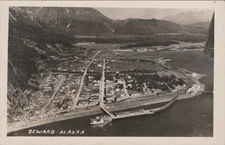 Seward Alaska Aerial View of Town with Mountains and Waterfront 1940s RPPC
