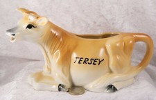 Ceramic lying down 4.5 inches tall milk jug Jersey Cow cattle farmyard animal