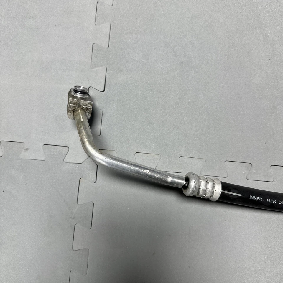 Manguera de succión de aire acondicionado Subaru Legacy Outback 2005-2009 2,5 L OEM 73425AG04B Foto 3 de 4