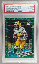 Dontayvion Wicks 2023 Donruss Optic #249 Green Velocity Prizm RC Rated PSA 10