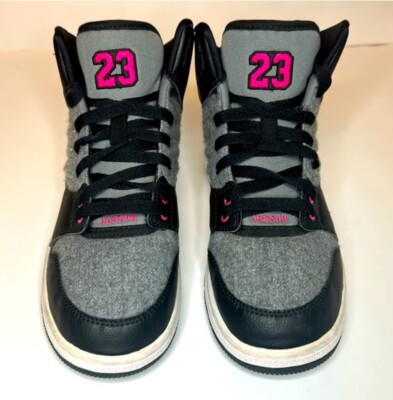 black and pink jordans high tops