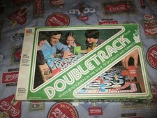 MILTON BRADLEY DOUBLE TRACK BOARD GAME - ABOUT 80% COMPLETE , MISSING SOME GATES