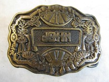 1975 BELT BUCKLE BY ODEN INC FEATURES THE NAME " JOHN "