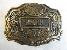 1975 BELT BUCKLE BY ODEN INC  FEATURES THE NAME " JOHN " 