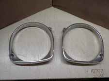 GM 1374296 RH inner & 1374297 LH Chrome Headlight Bezel Doors 1966 Buick