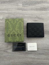 Gucci GG Emblem Bi-fold Wallet In Genuine Black Leather