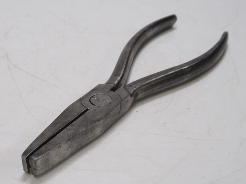 6-inch flat nose pliers dated 1952 from an English kit
