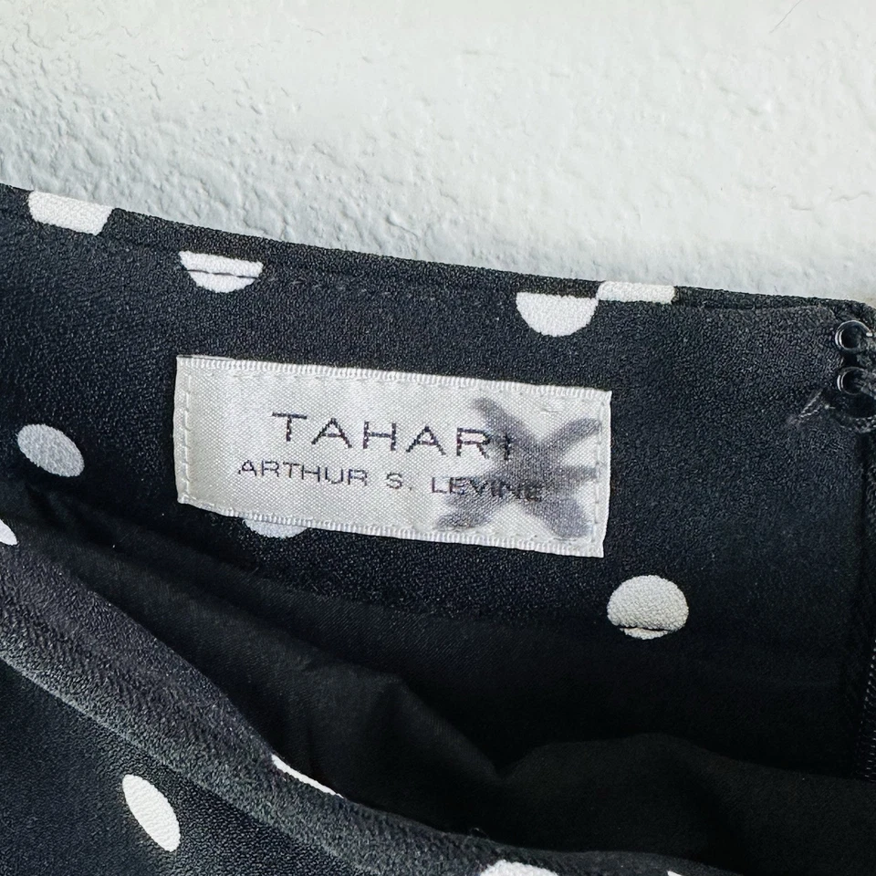 Falda midi Tahari negra blanca plisada forrada a lunares talla 22 Foto 2 de 4