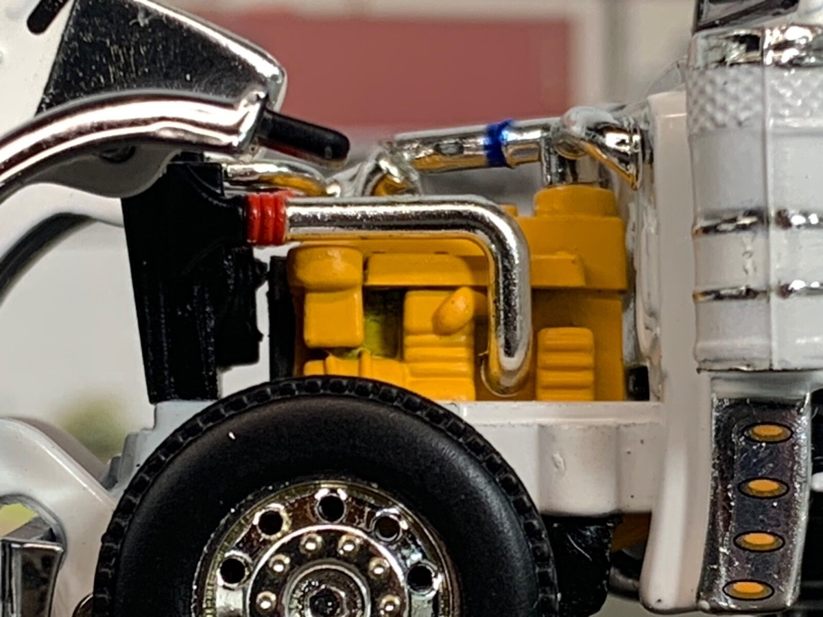 1/64 DCP WHITE PRIDE & CLASS PETERBILT 389 W/ 63