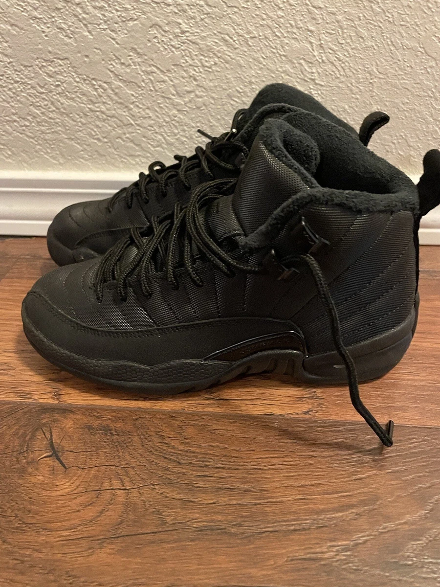 Jordan 12 winterized black grade school hotsell