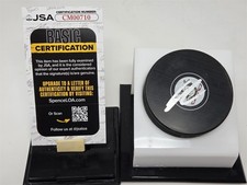 LEO CARLSSON signed DUCKS puck JSA COA