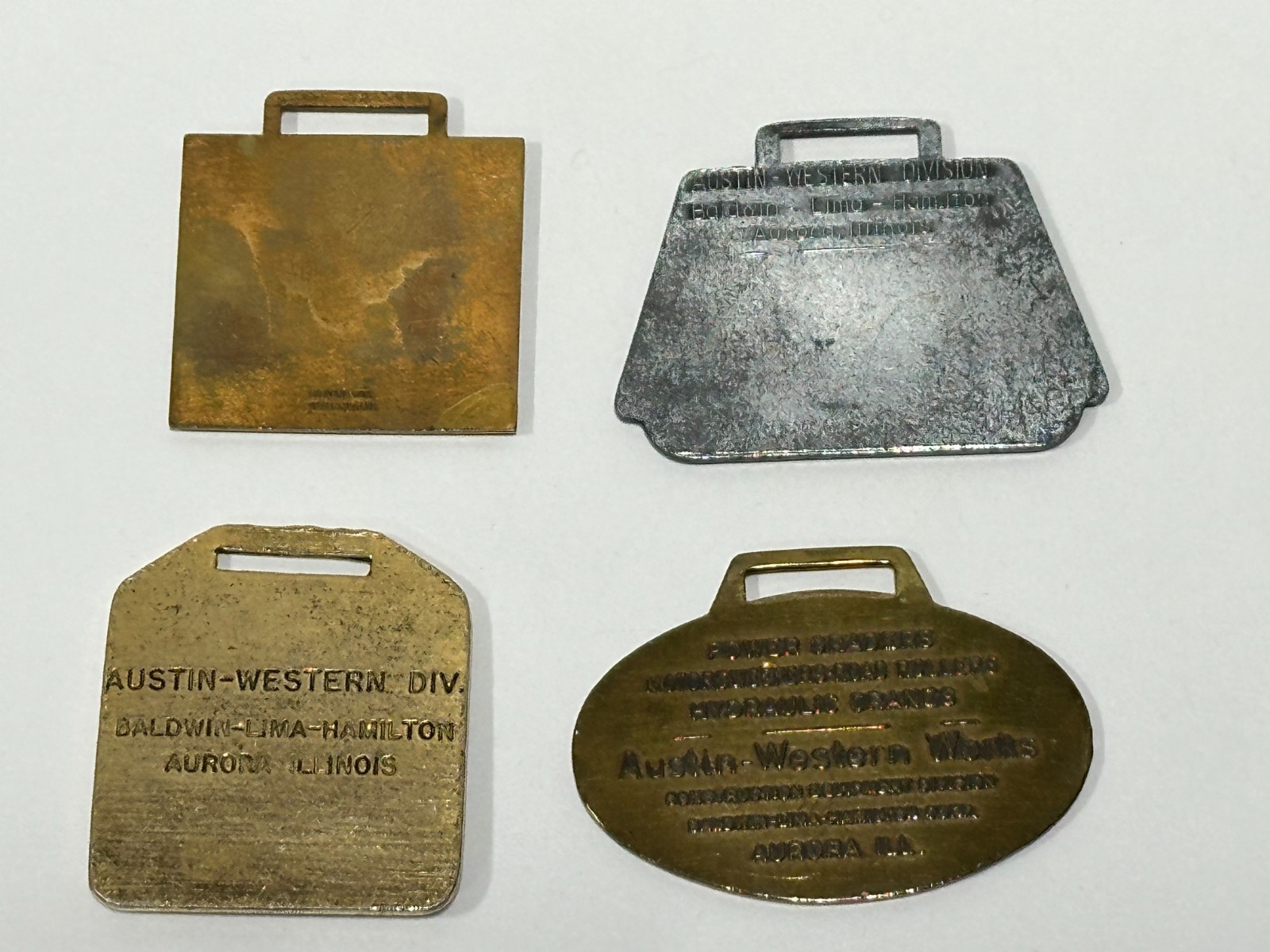 Vtg Austin Western Grader Watch Fob Construction Equipment Advertising lot of 4