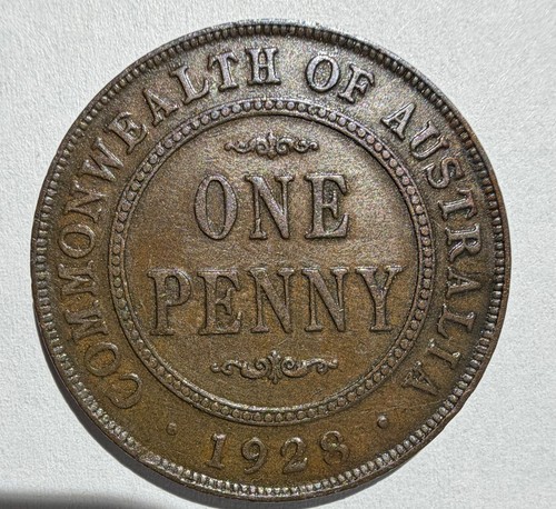 Penny Australia 1928 rotto 8 - Foto 1 di 2