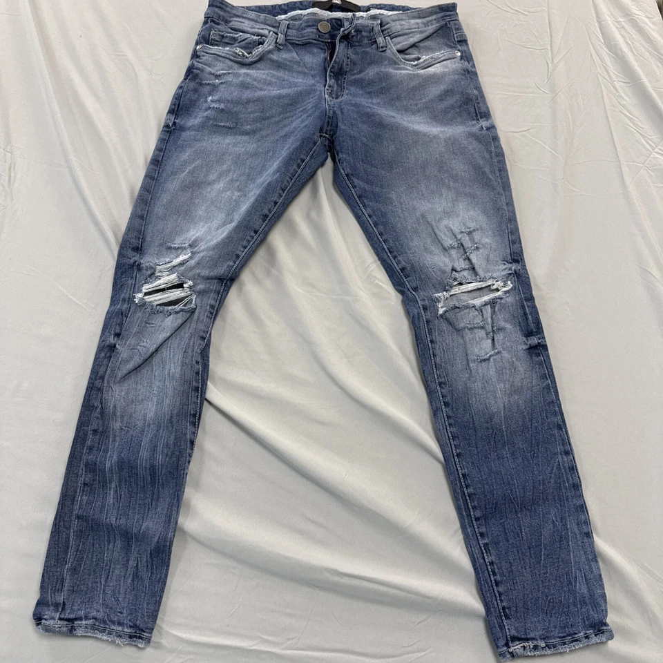 Pantalones de mezclilla ajustados Jordan Craig Ross para hombre talla 34 x 32 rasgados elásticos desgastados Foto 2 de 4