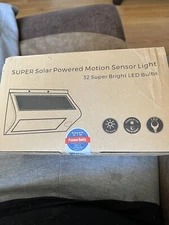 LED solar powered motion sensor security light